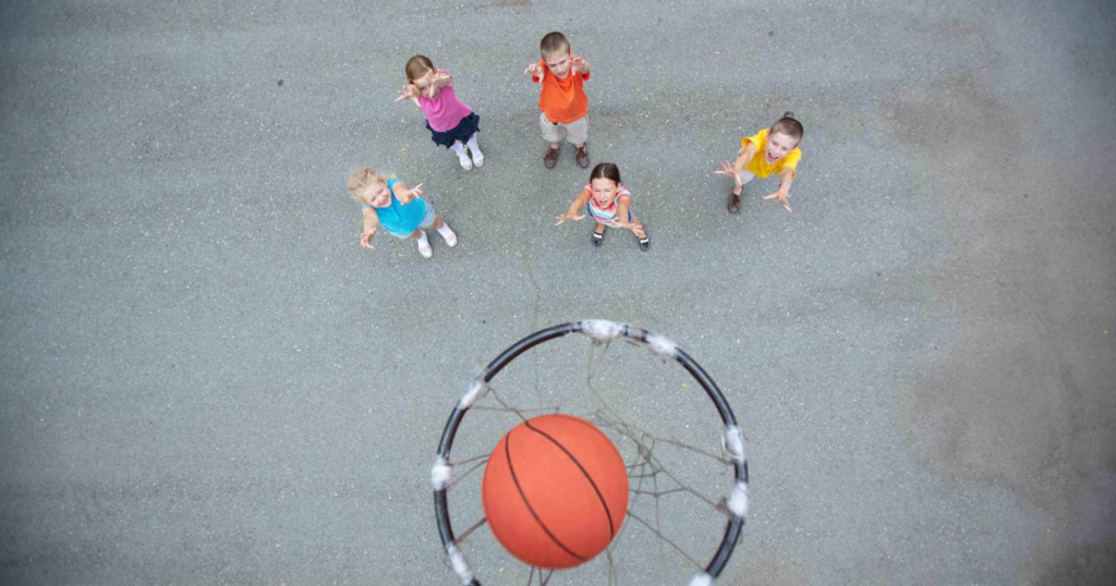 Children playing basketball